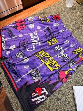 Classic Purple Graphic Athletic Mesh Shorts with Yellow & Red Accents